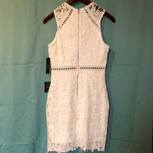 Sleeveless white crochet lace dress